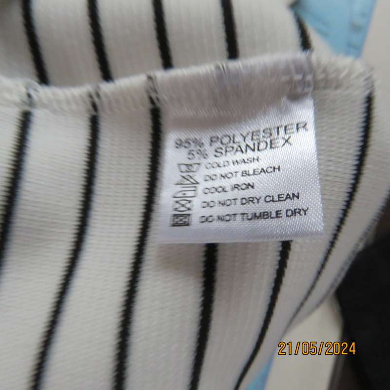 Body hugging white/black horizontal striped textured stretch polyester low calf dress. Size 32/8.