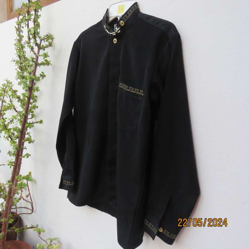black long sleeve shirt by TOP MAN size 8/9 years.