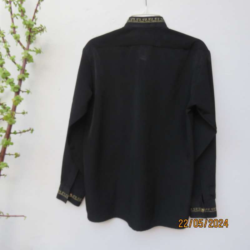 black long sleeve shirt by TOP MAN size 8/9 years.