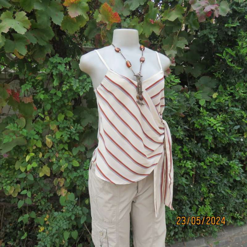 Sweet rich cream top with rust/grey stripes. Shoestring straps. Size 30 by REFINERY.Fold over.As new