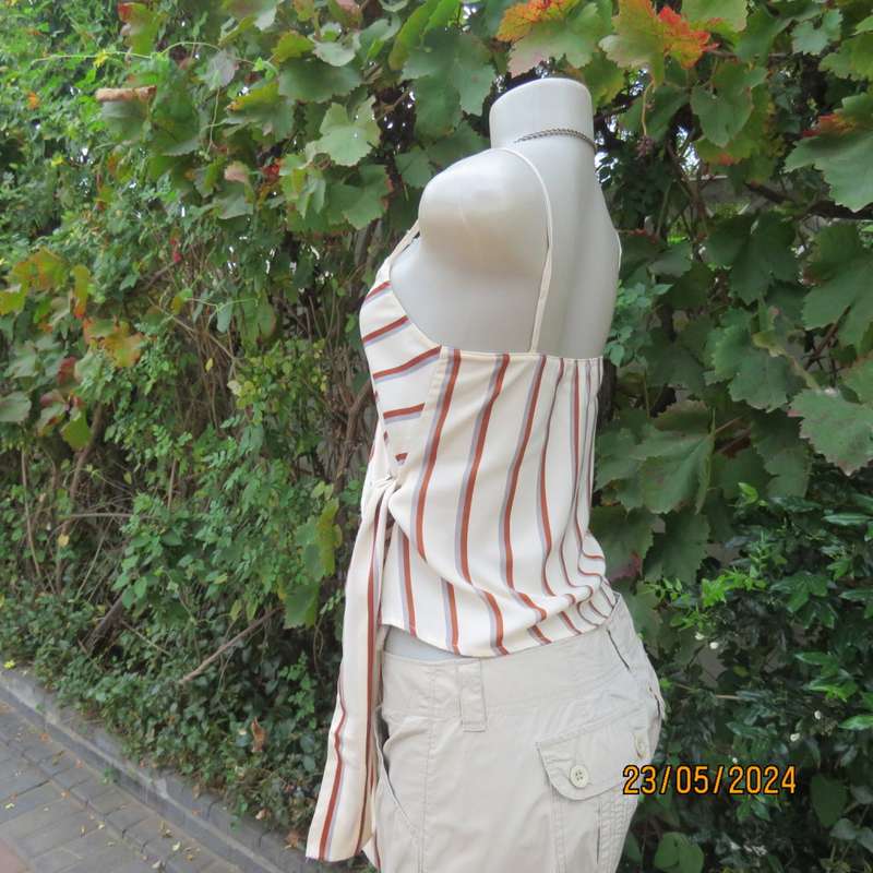 Sweet rich cream top with rust/grey stripes. Shoestring straps. Size 30 by REFINERY.Fold over.As new
