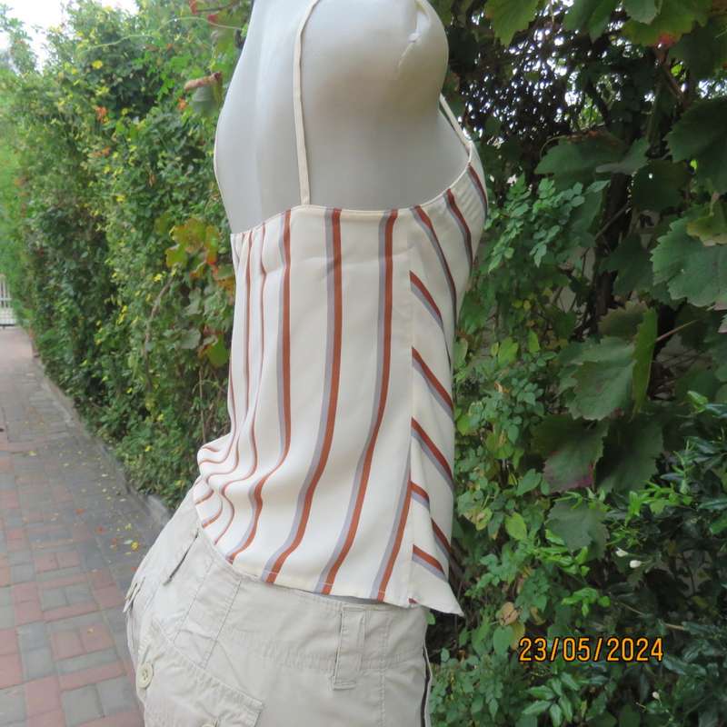 Sweet rich cream top with rust/grey stripes. Shoestring straps. Size 30 by REFINERY.Fold over.As new