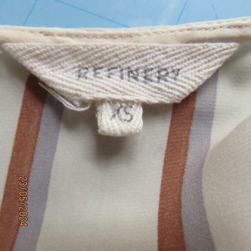 Sweet rich cream top with rust/grey stripes. Shoestring straps. Size 30 by REFINERY.Fold over.As new