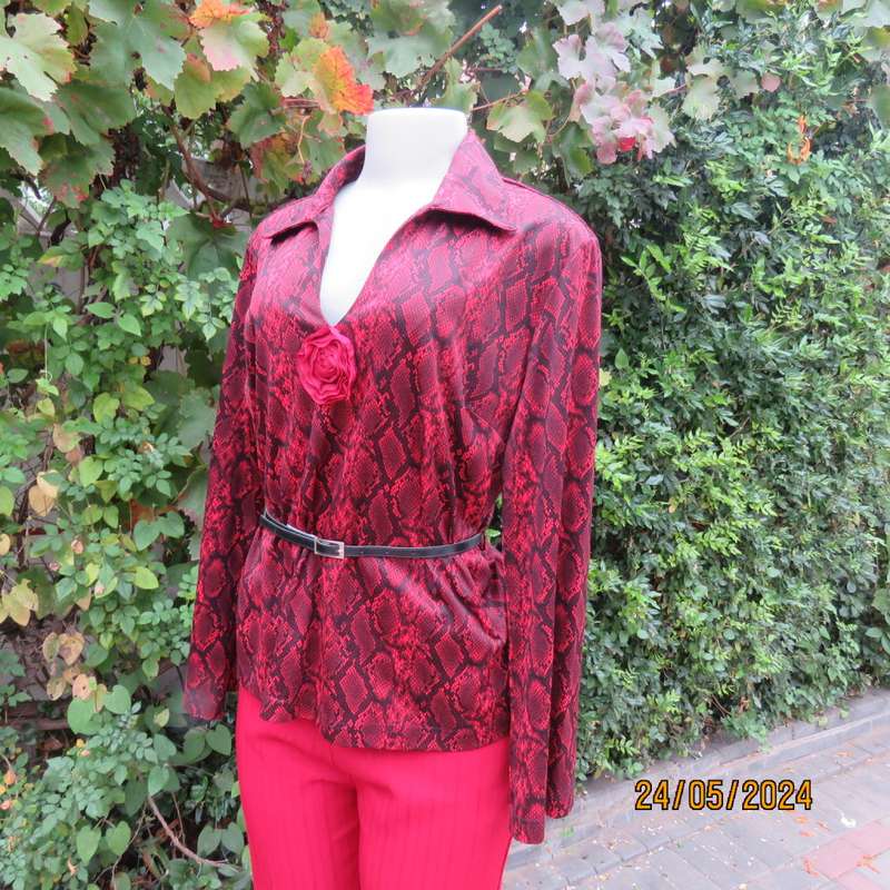 Charming red/black animal print slip over top with V neck and collar. By CHOOZIE size 38. As new.