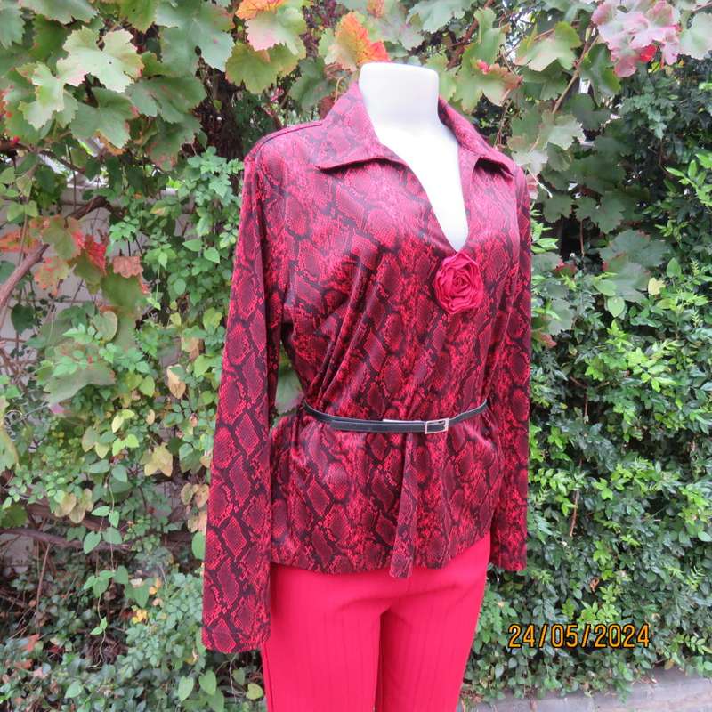 Charming red/black animal print slip over top with V neck and collar. By CHOOZIE size 38. As new.