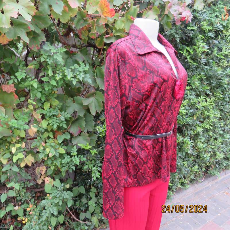 Charming red/black animal print slip over top with V neck and collar. By CHOOZIE size 38. As new.