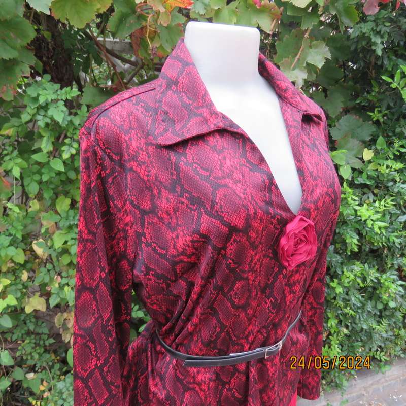 Charming red/black animal print slip over top with V neck and collar. By CHOOZIE size 38. As new.