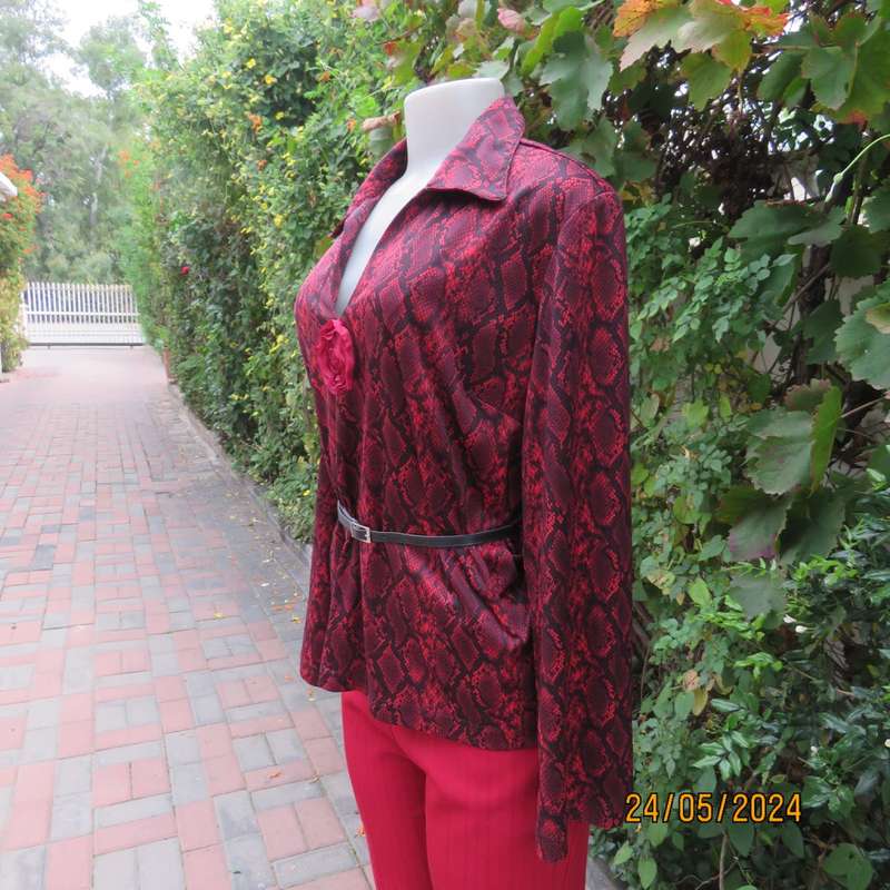Charming red/black animal print slip over top with V neck and collar. By CHOOZIE size 38. As new.