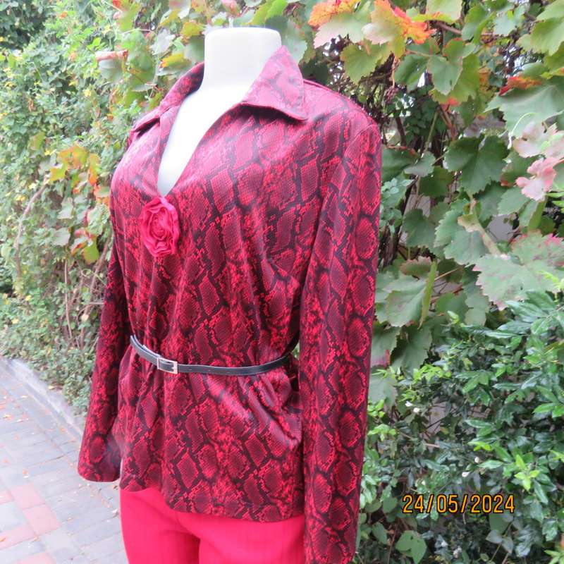 Charming red/black animal print slip over top with V neck and collar. By CHOOZIE size 38. As new.