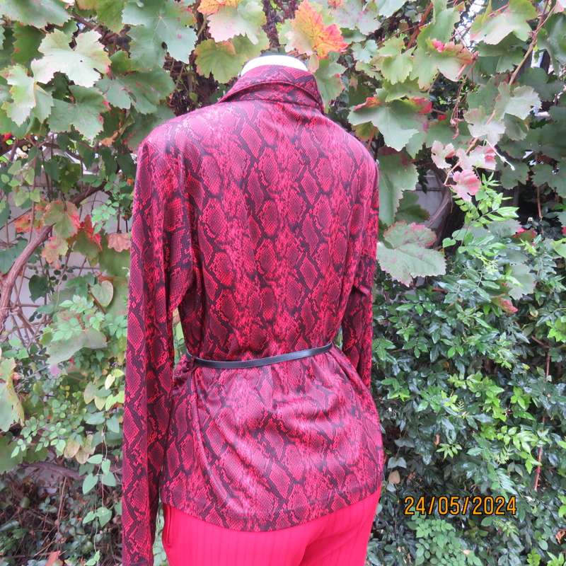 Charming red/black animal print slip over top with V neck and collar. By CHOOZIE size 38. As new.