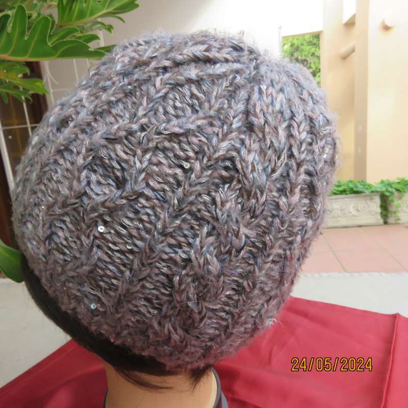 High quality grey with silver metallic fibre beanie and warm cream inner. Medium size. As new.