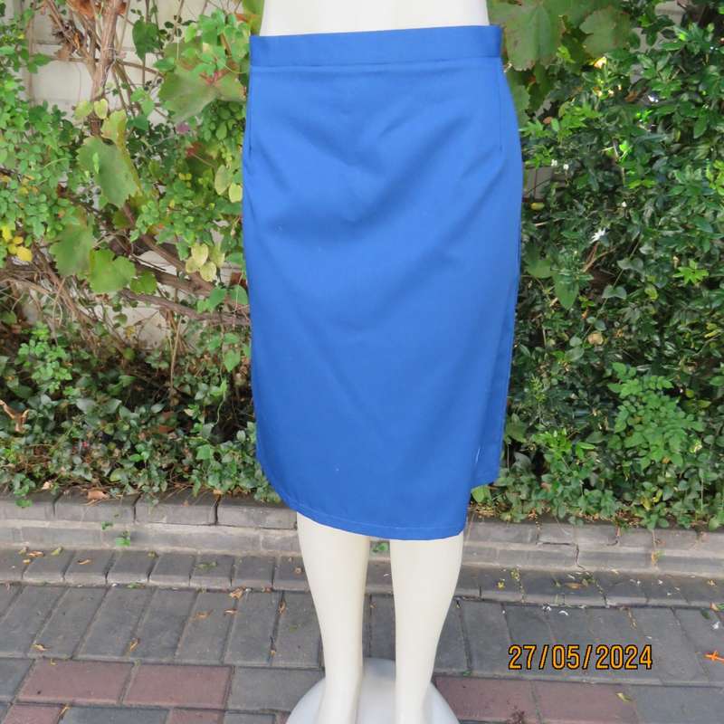 Smart admiral blue pencil skirt with zip and pleat at back. Firm polycotton. Size 40.Brand new cond