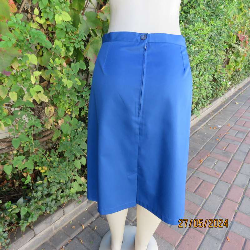 Smart admiral blue pencil skirt with zip and pleat at back. Firm polycotton. Size 40.Brand new cond