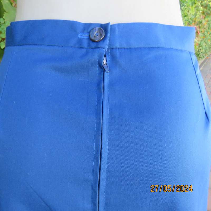 Smart admiral blue pencil skirt with zip and pleat at back. Firm polycotton. Size 40.Brand new cond