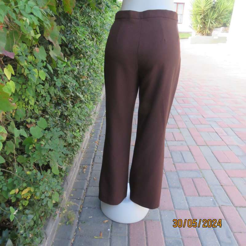 Beautiful choc brown bootlegged dress pants in stretch polyester. Size 36 by FASHION EXPRESS. As new