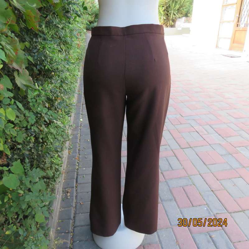 Beautiful choc brown bootlegged dress pants in stretch polyester. Size 36 by FASHION EXPRESS. As new