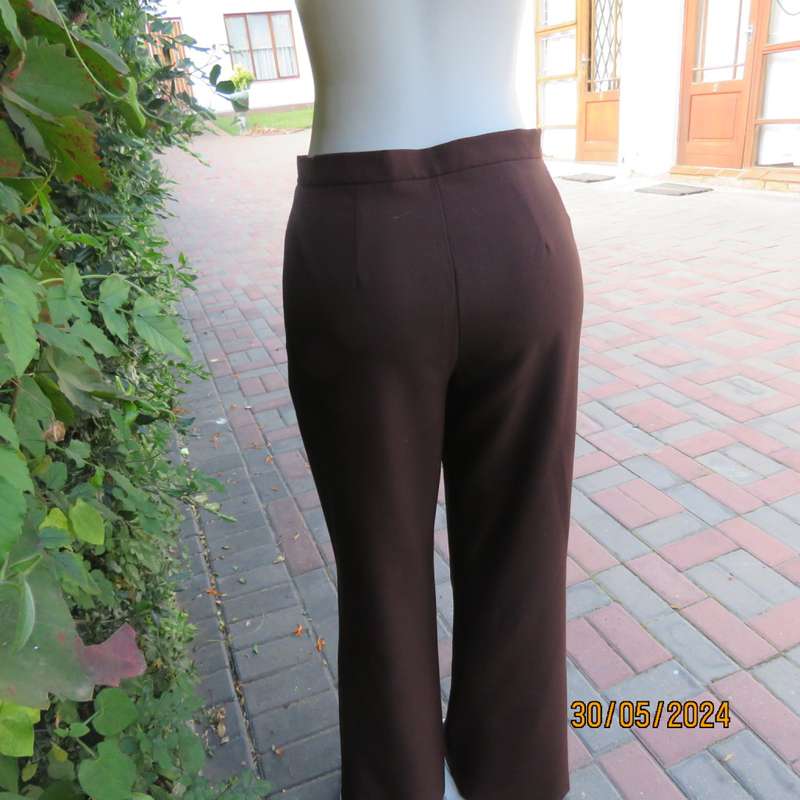 Beautiful choc brown bootlegged dress pants in stretch polyester. Size 36 by FASHION EXPRESS. As new
