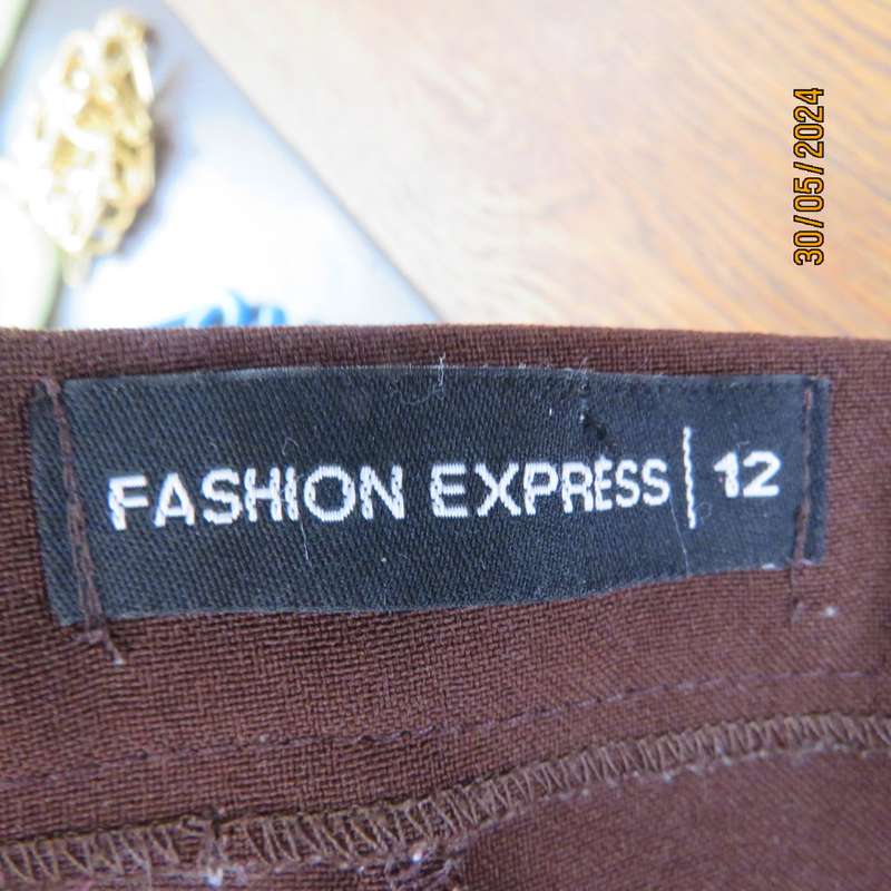 Beautiful choc brown bootlegged dress pants in stretch polyester. Size 36 by FASHION EXPRESS. As new