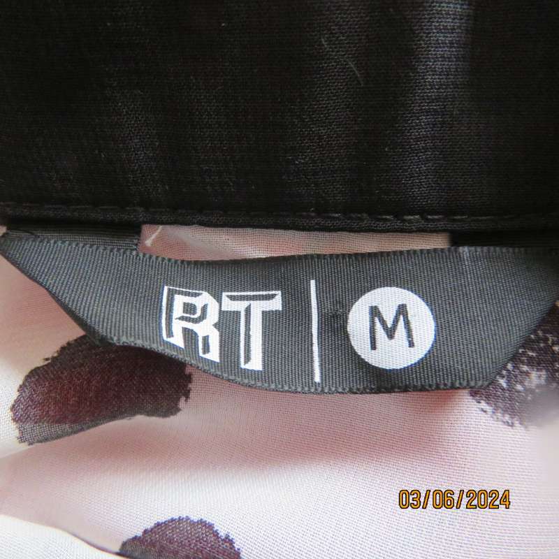 Pretty white sheer poly/black polkadot long sleeve top by RT size 36. Black collar, cuffs, front.