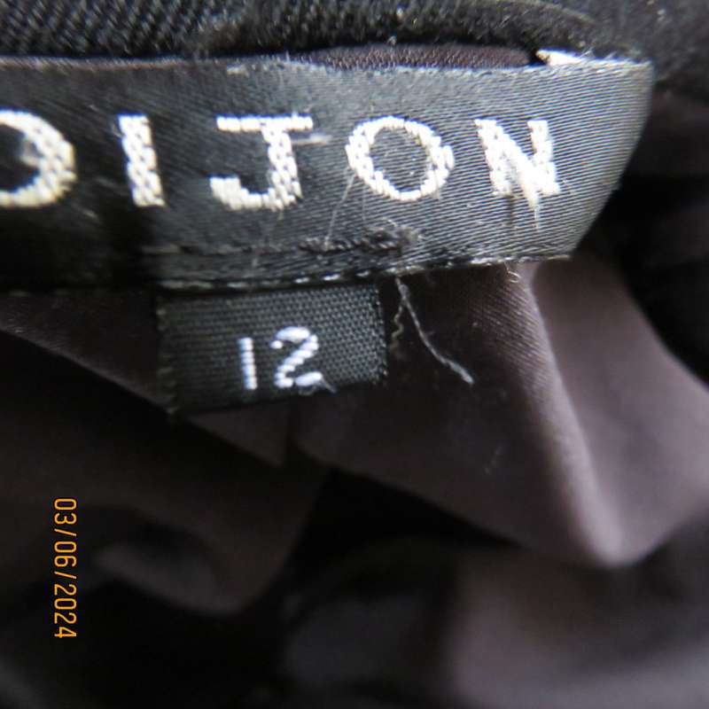 Elegant double breasted black long sleeve tailored poly/rayon jacket. Partly lined.By DIJON size 36.