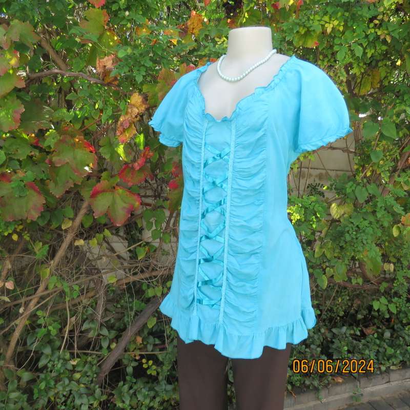 Feminine aquamarine blue peasant style top. Zip at side. Front gathered/decorated panels.Size 42.
