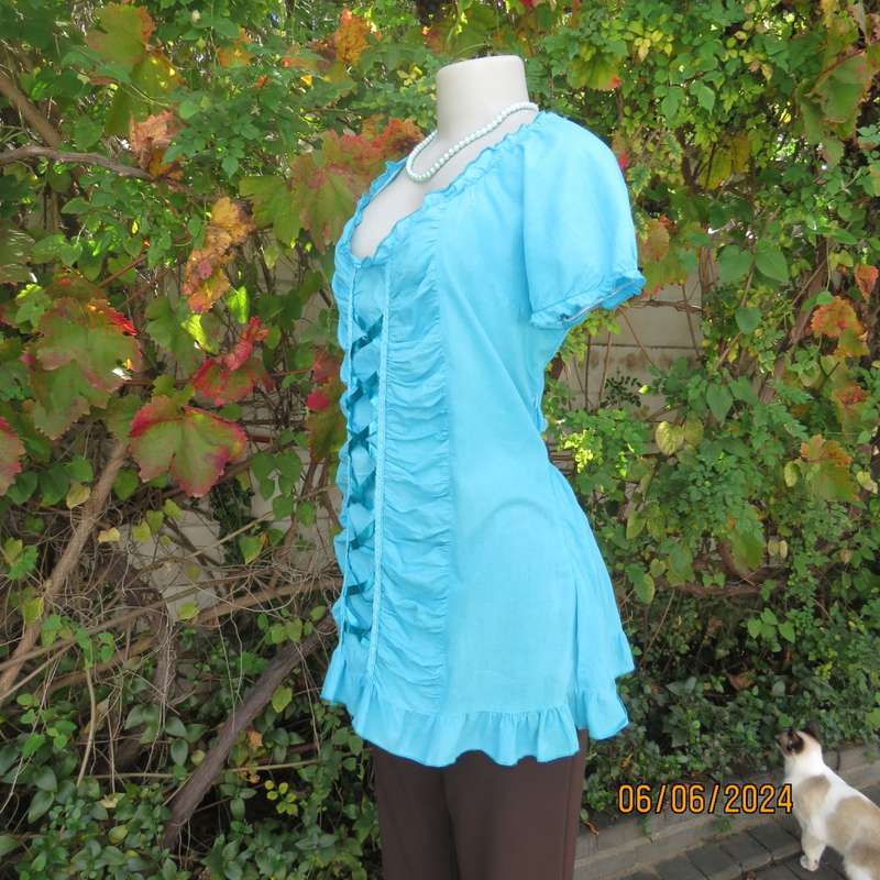 Feminine aquamarine blue peasant style top. Zip at side. Front gathered/decorated panels.Size 42.