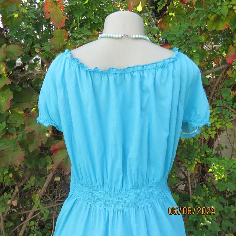 Feminine aquamarine blue peasant style top. Zip at side. Front gathered/decorated panels.Size 42.