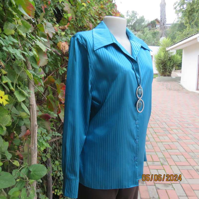 Luxury satin polyester jade long sleeve button down top/open collar. By TLC size 34. Brand new cond.