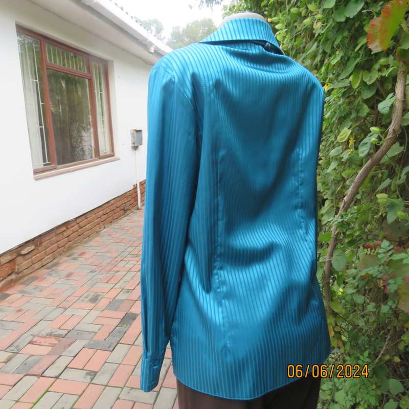 Luxury satin polyester jade long sleeve button down top/open collar. By TLC size 34. Brand new cond.
