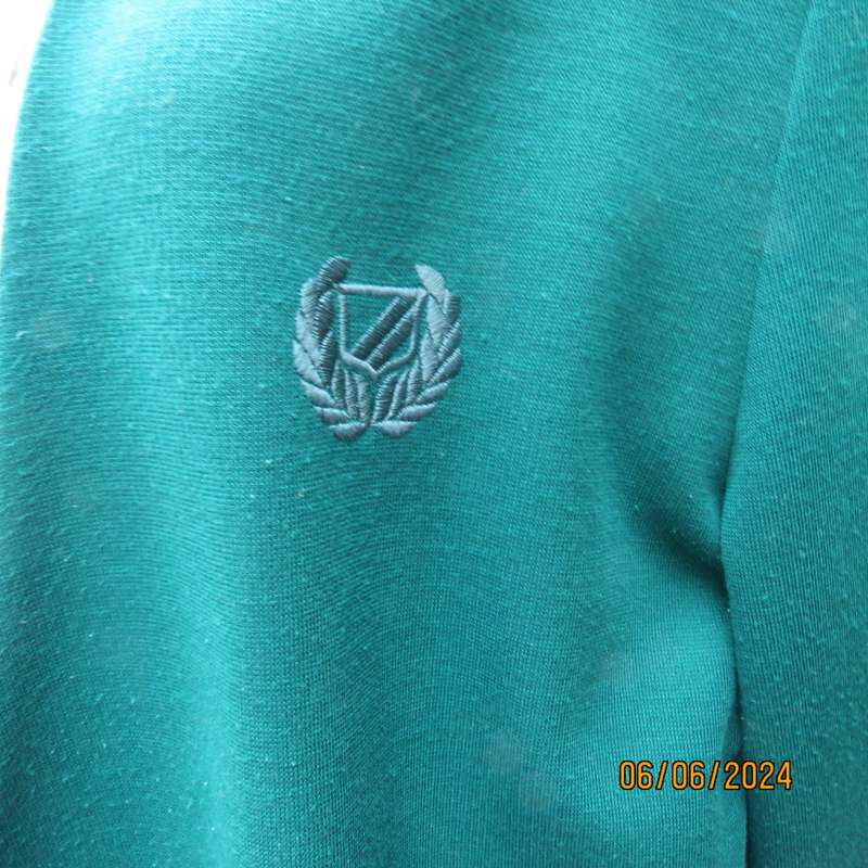 Smart, warm dark green jade polyester knit double breast collerless jacket by WOOLWORTHS size 42.