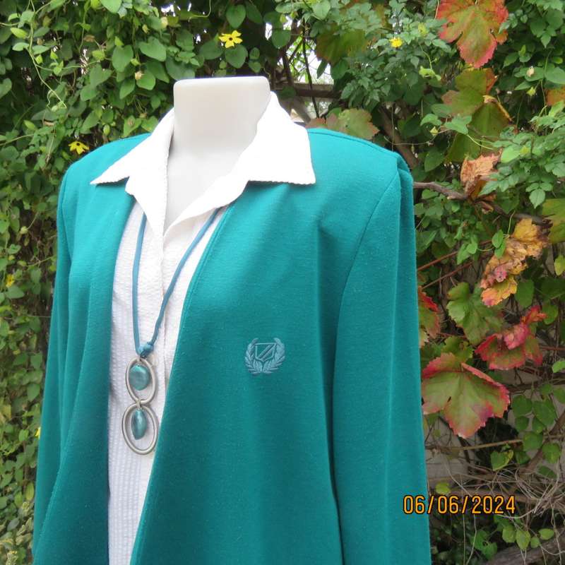 Smart, warm dark green jade polyester knit double breast collerless jacket by WOOLWORTHS size 42.