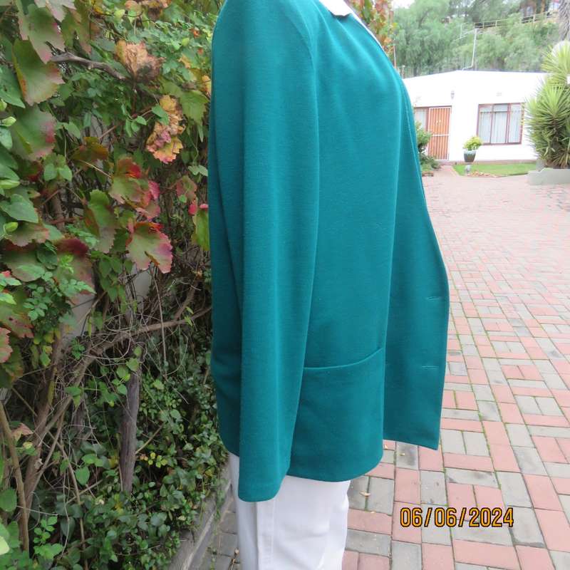 Smart, warm dark green jade polyester knit double breast collerless jacket by WOOLWORTHS size 42.