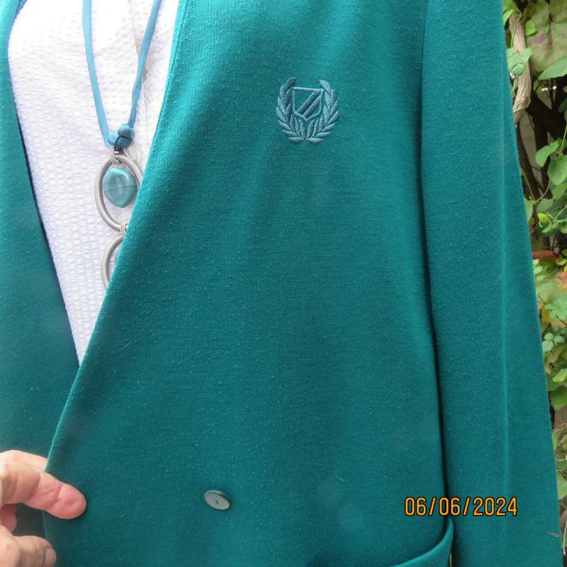 Smart, warm dark green jade polyester knit double breast collerless jacket by WOOLWORTHS size 42.