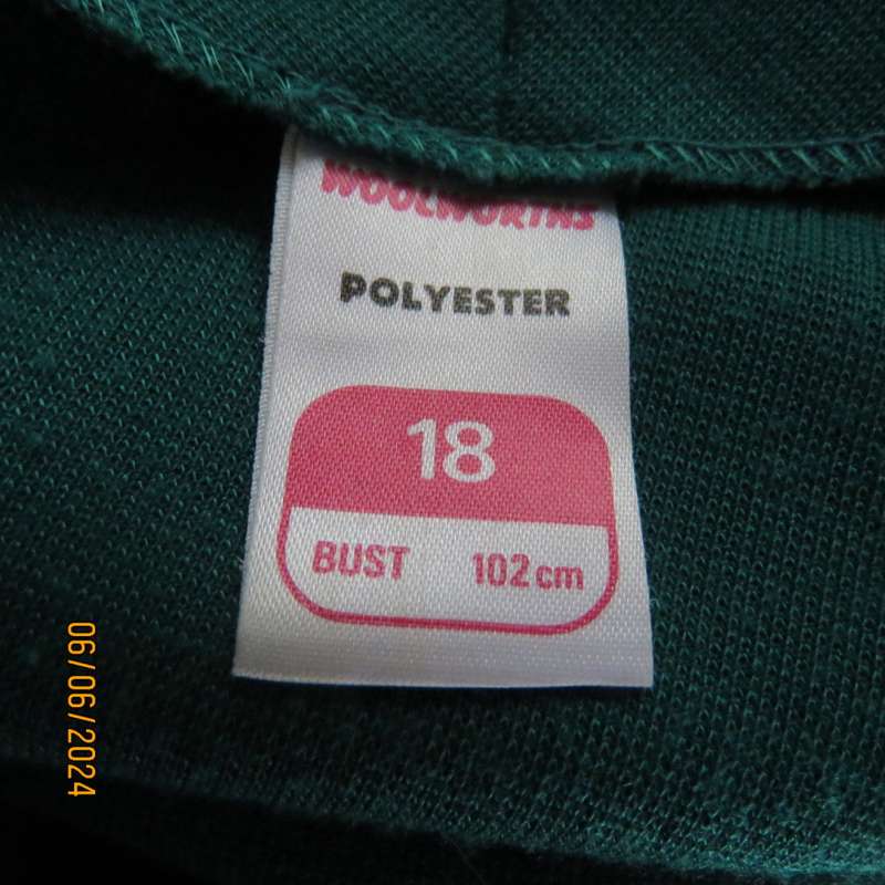 Smart, warm dark green jade polyester knit double breast collerless jacket by WOOLWORTHS size 42.
