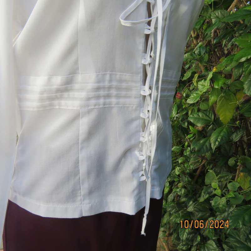 Charming white fine cotton long sleeve top by URB from USA size 35. Braiding closure.Cropped. As new