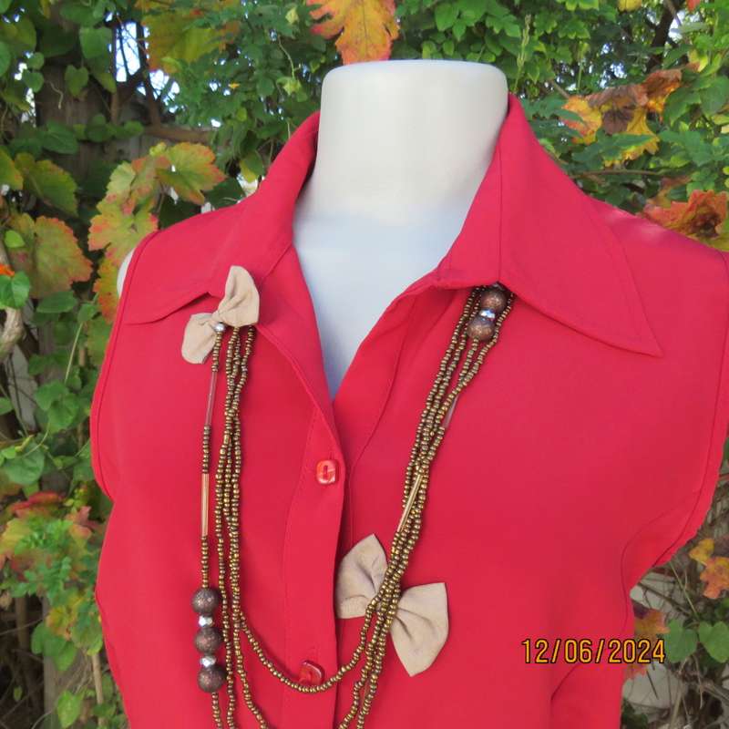 Sweet, red, button down tailored top in silky polyester. Size 36. Open collar. New condition