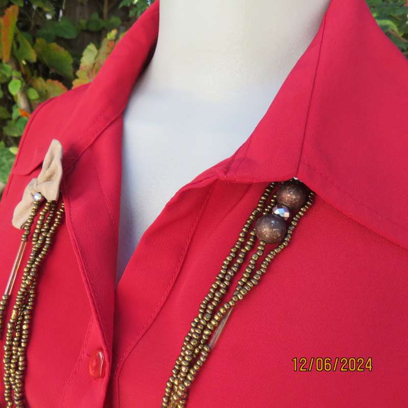 Sweet, red, button down tailored top in silky polyester. Size 36. Open collar. New condition