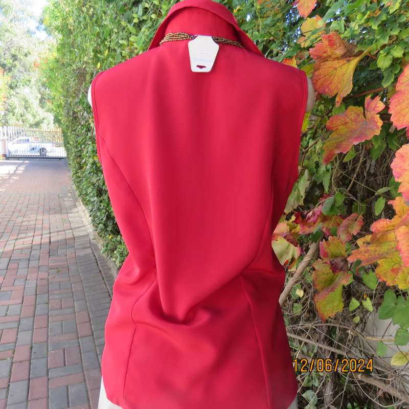 Sweet, red, button down tailored top in silky polyester. Size 36. Open collar. New condition