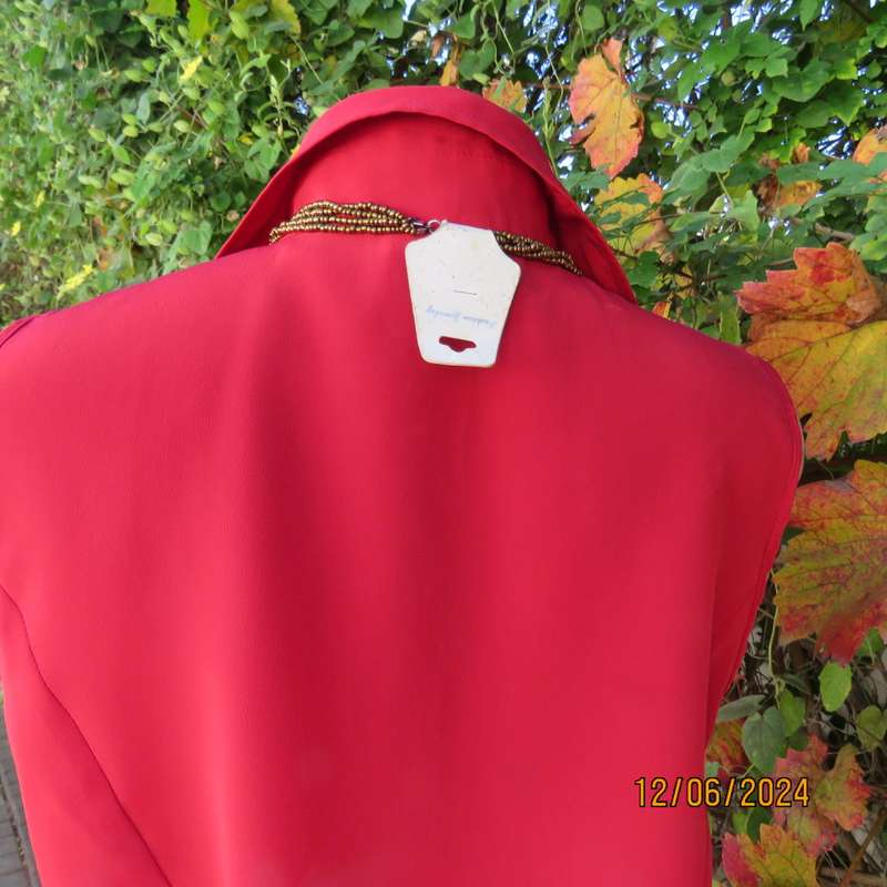 Sweet, red, button down tailored top in silky polyester. Size 36. Open collar. New condition