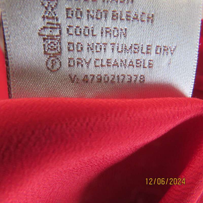 Sweet, red, button down tailored top in silky polyester. Size 36. Open collar. New condition