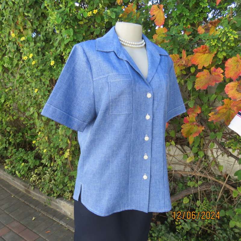 Standard mottled steel blue button down/open collar top. Two thin front pockets. Size 37. As new.