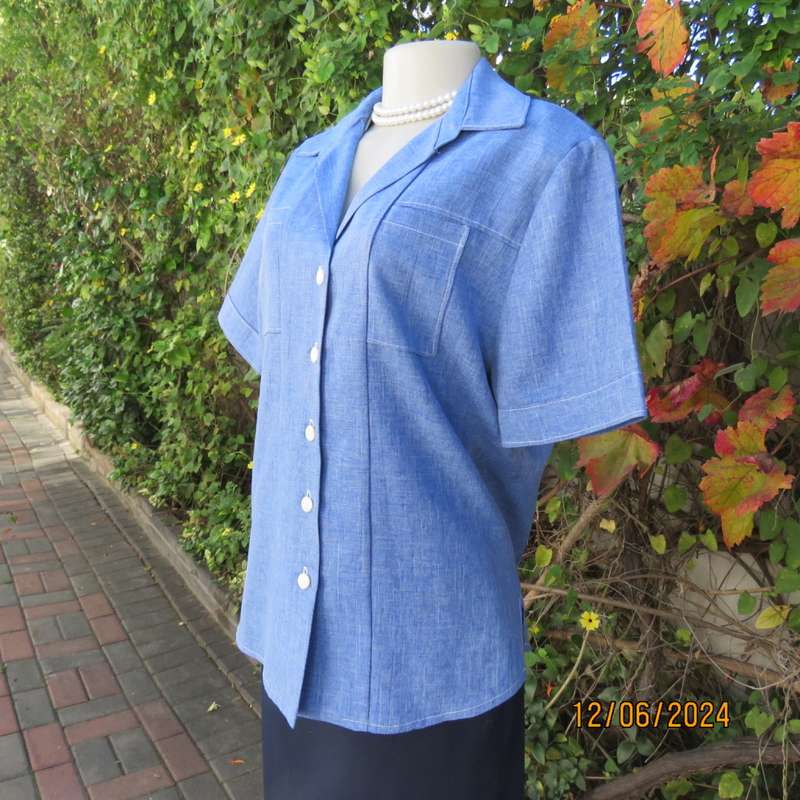 Standard mottled steel blue button down/open collar top. Two thin front pockets. Size 37. As new.