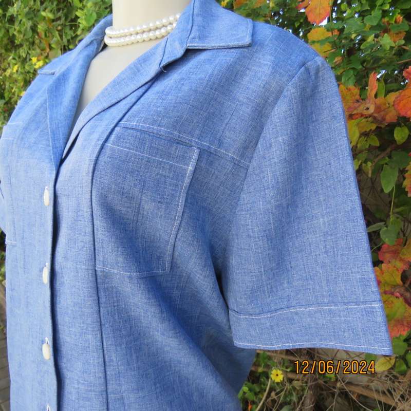 Standard mottled steel blue button down/open collar top. Two thin front pockets. Size 37. As new.