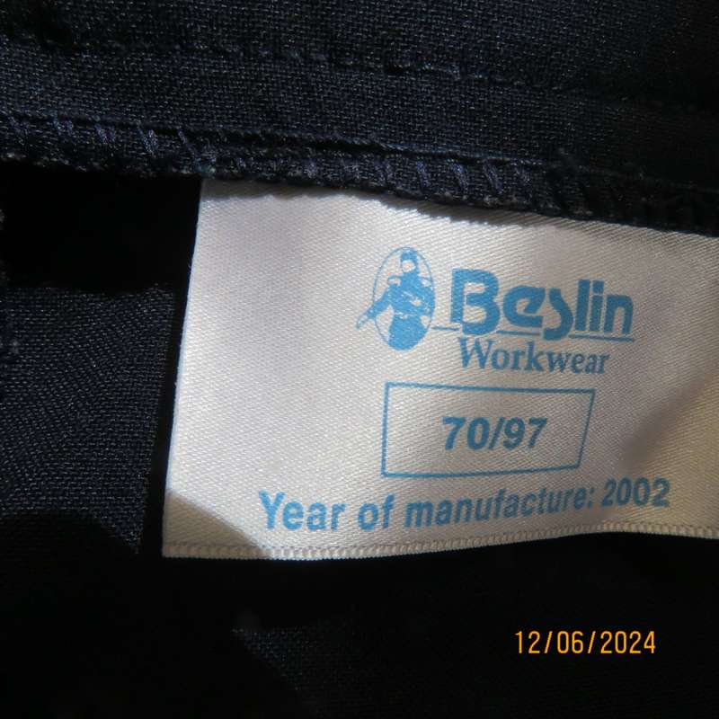 As new dark navy polycotton pencil skirt by BESLIN size 36. Zip and pleat at back.Plain but elegant.