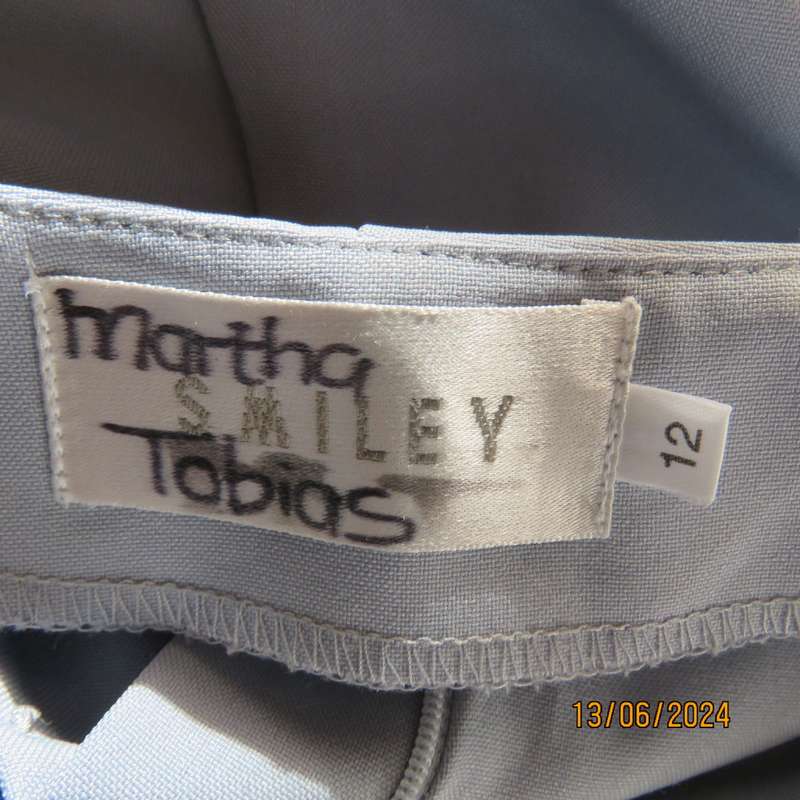 Bandless carolina blue straight legged dress pants in 100% polyester. Size 36 by SMILEY. As new