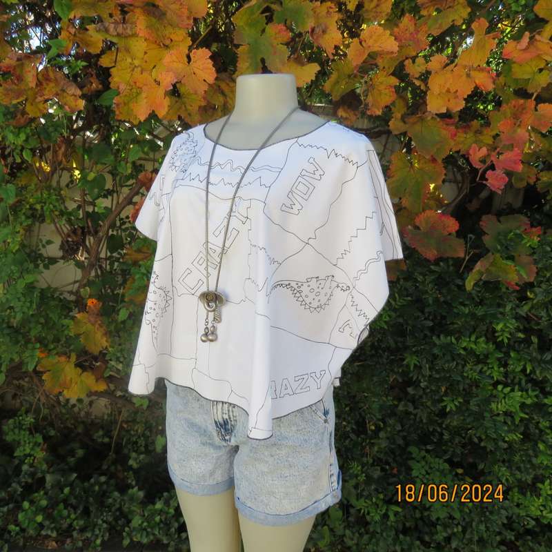 Unique white halfmoon polycotton top with black dragons/logos.Slip over. Free size. As new