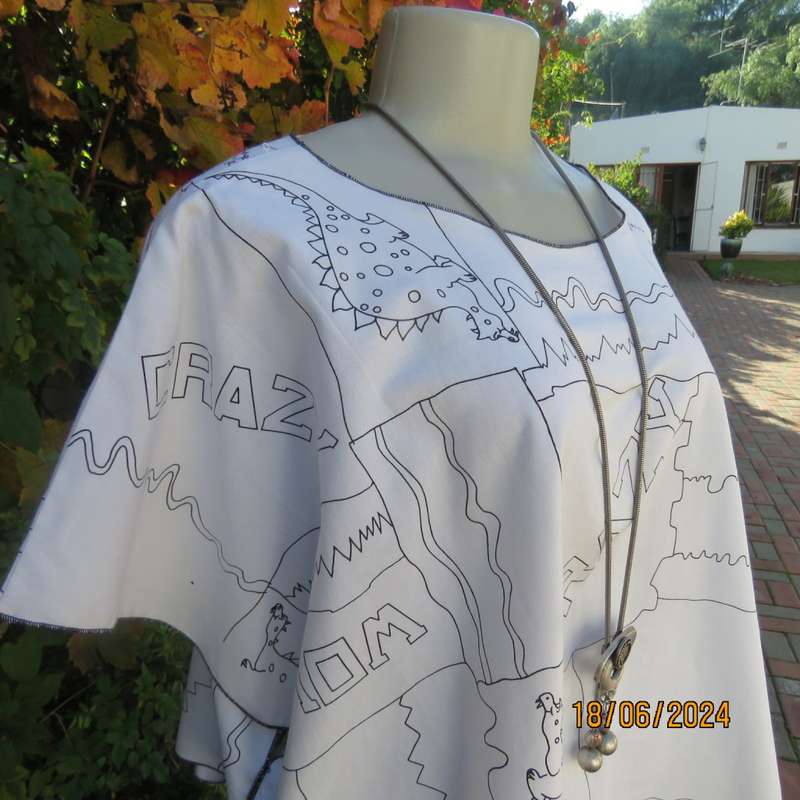 Unique white halfmoon polycotton top with black dragons/logos.Slip over. Free size. As new
