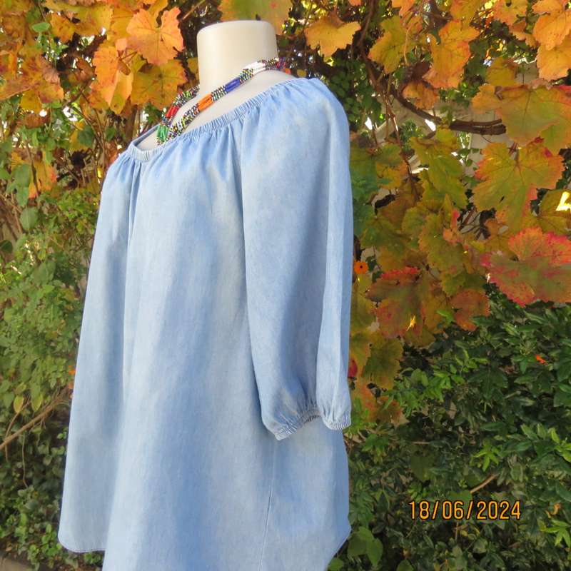 Stunning blue denim slip over short sleeve top. Wide elasticated neckline. By BE YOURSELF.Size 42/44