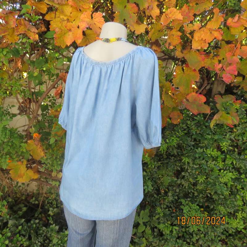 Stunning blue denim slip over short sleeve top. Wide elasticated neckline. By BE YOURSELF.Size 42/44