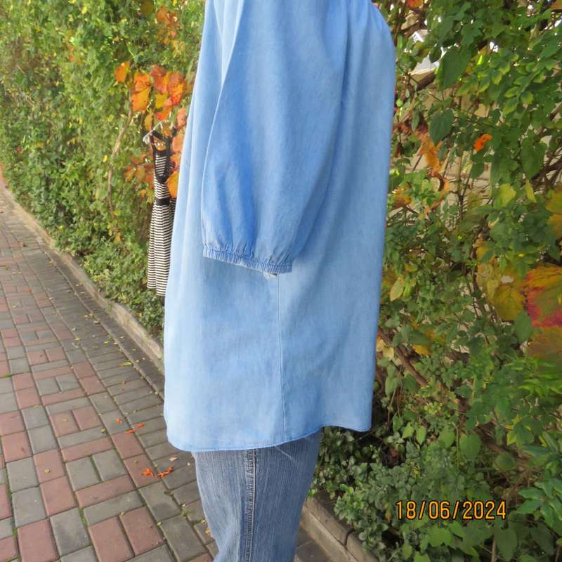 Stunning blue denim slip over short sleeve top. Wide elasticated neckline. By BE YOURSELF.Size 42/44